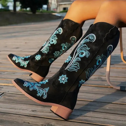 Sandales pour femme Adriana Santiag Yehaw en cuir noir, avec talon moyen et design élégant.