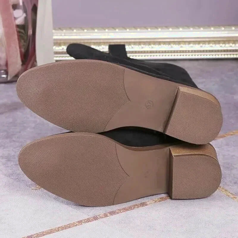 Chaussures santiags pour femme Yehaw Antonia en noir, avec détails en cuir élégants et style western sophistiqué.