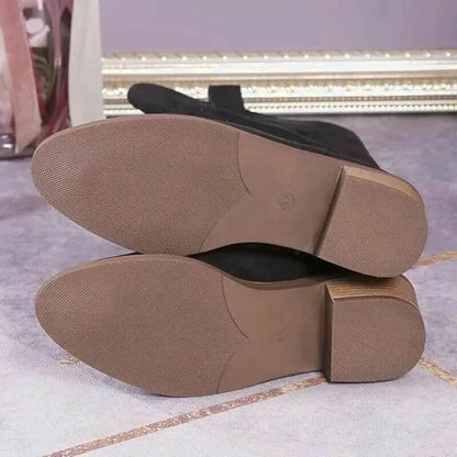 Chaussures santiags pour femme Yehaw Antonia en noir, avec détails en cuir élégants et style western sophistiqué.