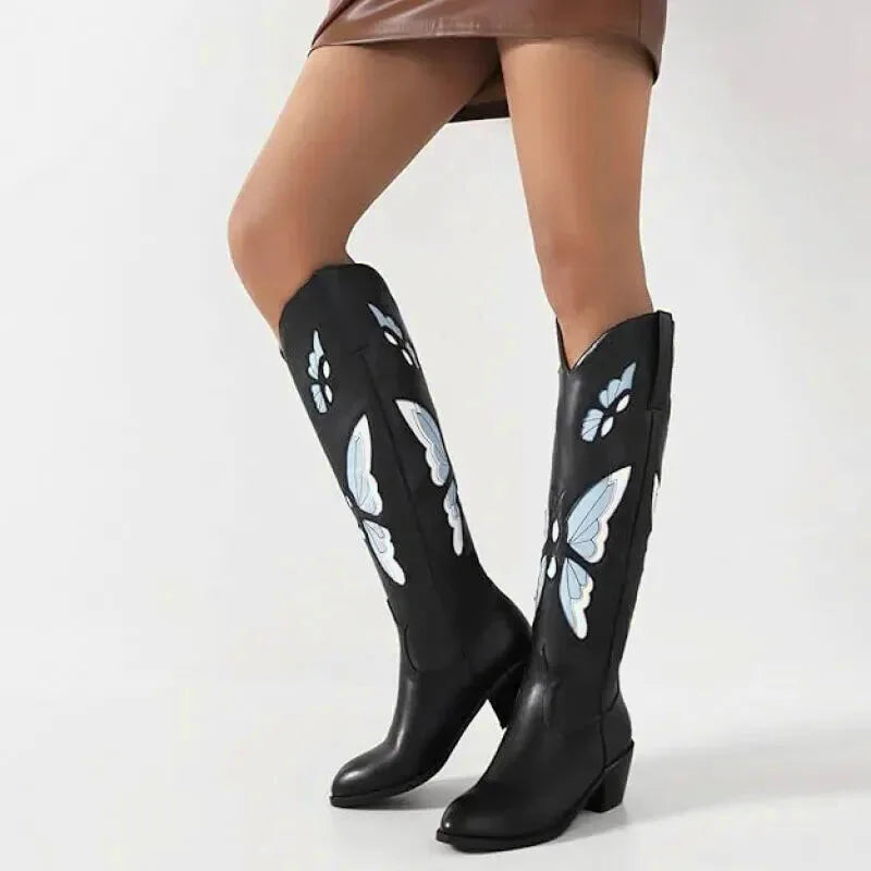 Chaussures santiag pour femme Yehaw Clara en noir et bleu, avec détails en cuir et talon moyen, vues de face et côté.