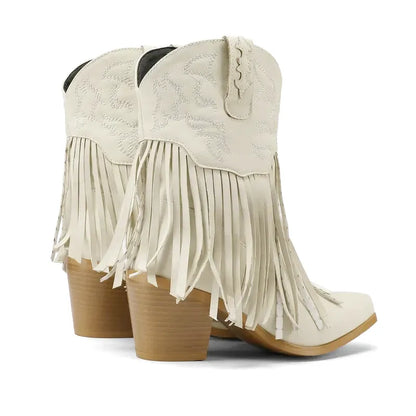 Dalia Santiag pour femme Yehaw en cuir beige avec talons, style cowboy, visible sur une femme portant ces bottes.
