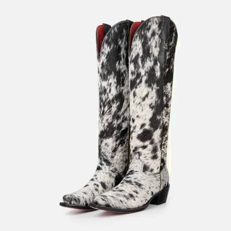 Bottes Vache Santiag pour femme Yehaw en noir et blanc, design élégant avec détails en cuir, mode et confort assurés.