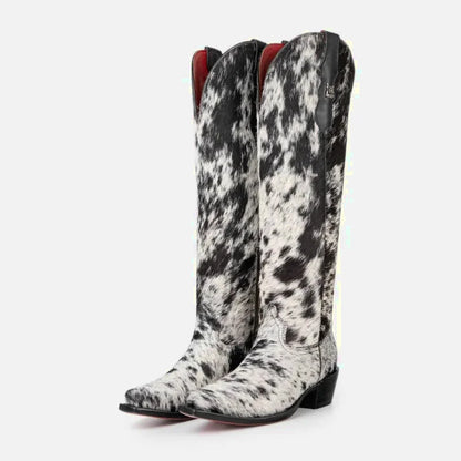 Bottes Vache Santiag pour femme Yehaw en noir et blanc, design élégant avec détails en cuir, mode et confort assurés.